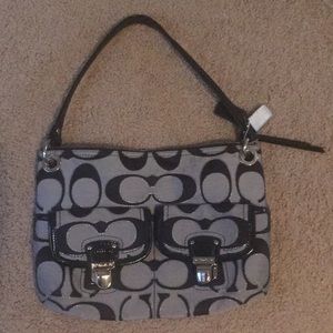 Black, grey and silver Coach purse